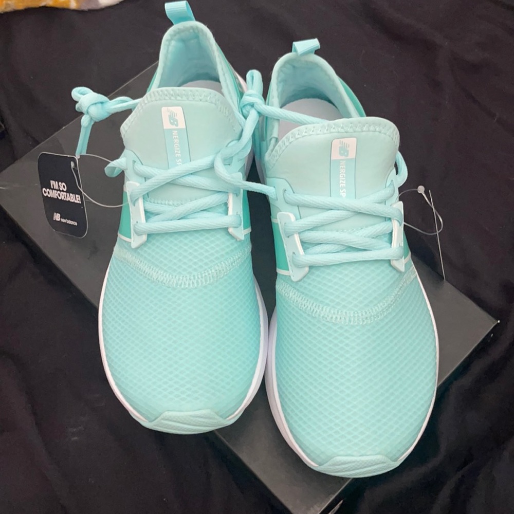 New Balance size 7 teal . New with tags